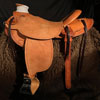 5 inch front Wade 15 & 1/2 inch seat, Gullet - 7 and 1/2 inch by 6 and 1/4 inch by 4 inch, 4&1/4 inch round horn, 92 degree bars, 7/8ths flat palte riggin, cantle 12&1/2 inch by 4 inch high cantle with 1&3/4inch Cheyenne Roll, Smooth-out half-breed Wade Saddle built by Keith Valley.